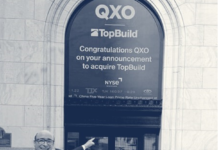 qxo compra a topbuild